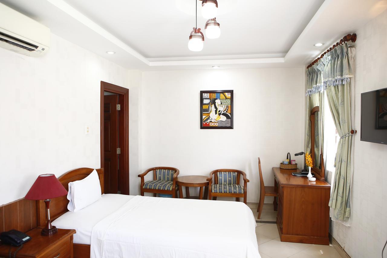 Phu An Hotel Хошимин Экстерьер фото